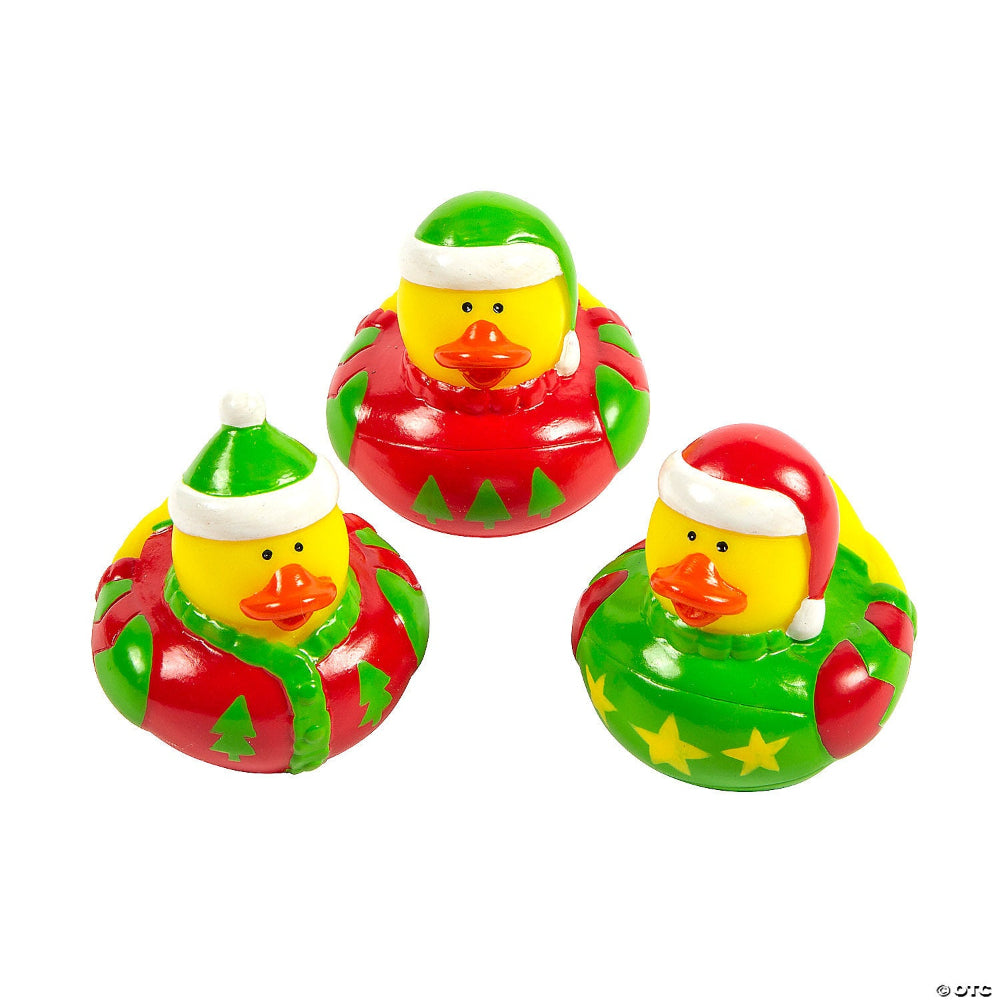 Three Christmas-themed ugly sweater rubber ducks with hats and scarves on a white background