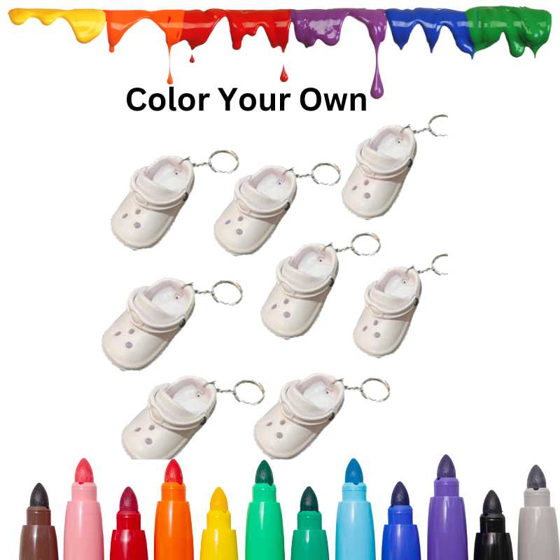 White mini rubber shoe keychains designed to look like small clogs, intended for painting and customization.