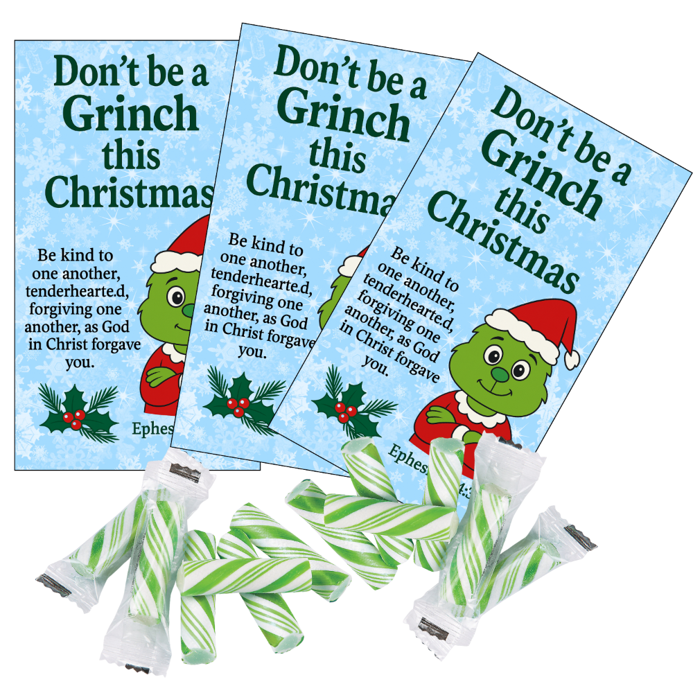 Three 'Don't be a Grinch this Christmas' cards with candy on a white background