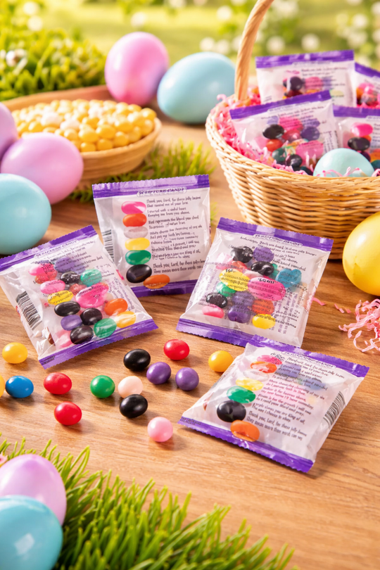 Colorful candy jellybean prayer packets with Easter eggs on a wooden table