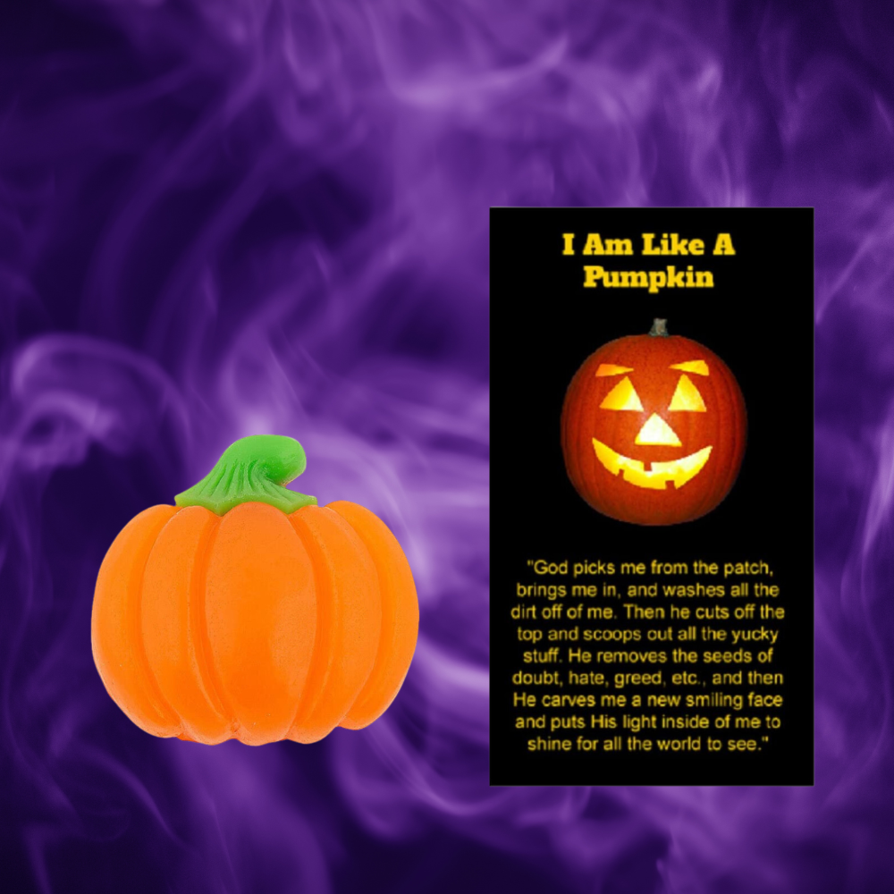 A pumpkin-shaped gummy candy with a greeting card that has a prayer and a pumpkin image, indicating a Halloween theme.