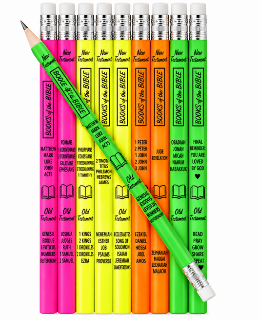 A set of colorful pencils arranged upright in a fan shape with one green pencil laid diagonally across them. Each pencil is printed with Bible book titles and verses, and the eraser ends are labeled 'NEW TESTAMENT'.