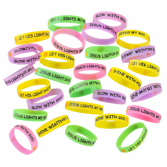 Assorted colorful wristbands with motivational Christian messages on a white background