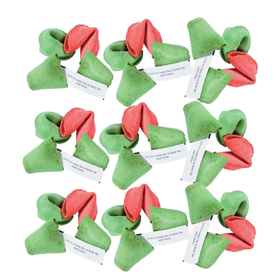 Green and red fortune cookies with white labels on a white background