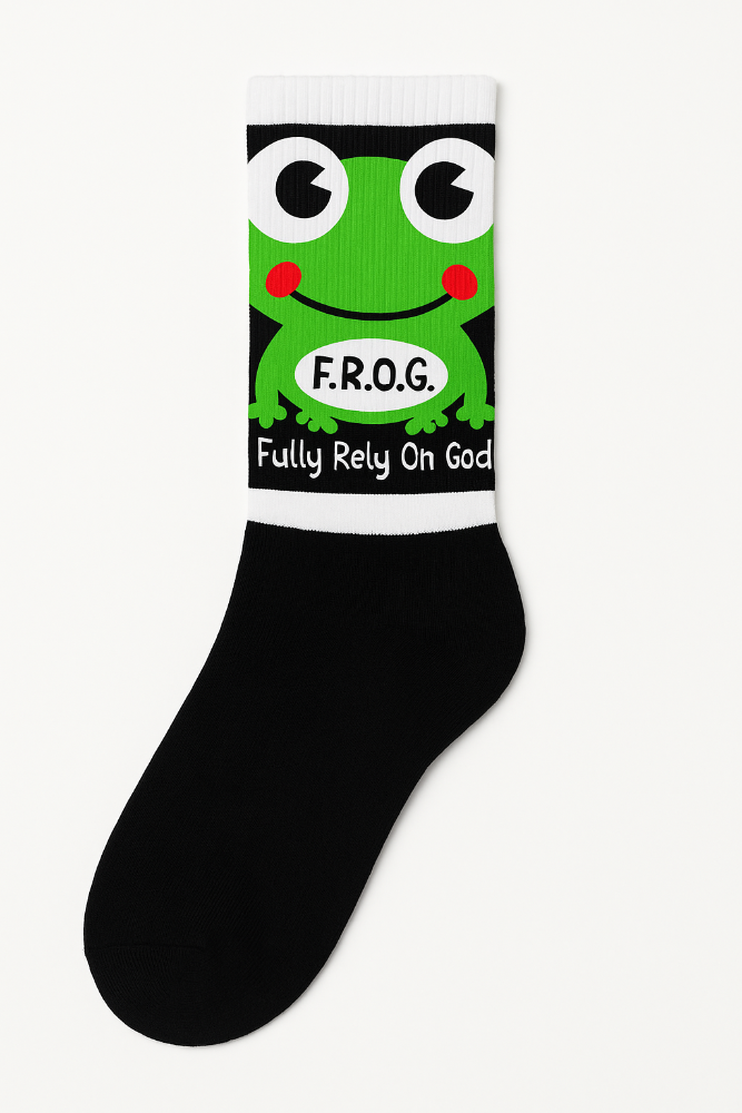 Black sock with a green frog graphic and 'F.R.O.G. Fully Rely On God' text on a white background
