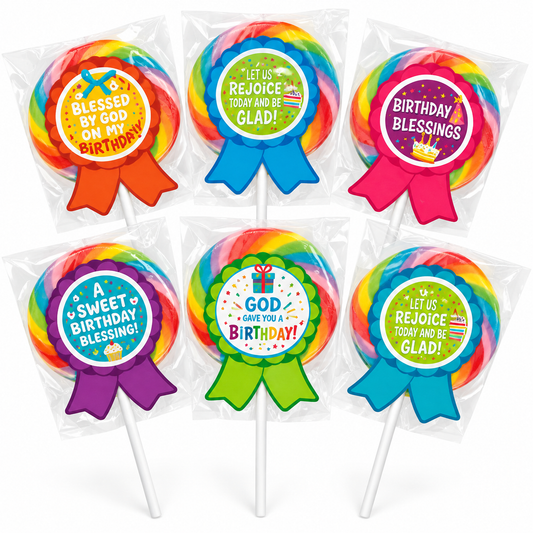 Six packaged rainbow lollipops with colorful birthday-themed topper labels, arranged on a white background.