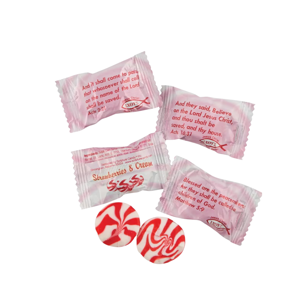Pink and white candy packets with religious text and two red and white peppermint candies on a white background.